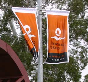 Street banners in the brand seasonal colour palette